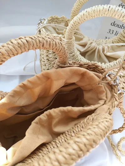 Women's hand carry straw bag