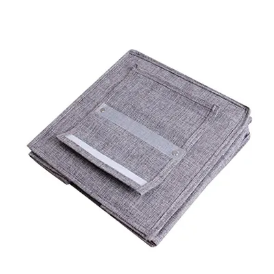 The linen cabinet contains hanging bags