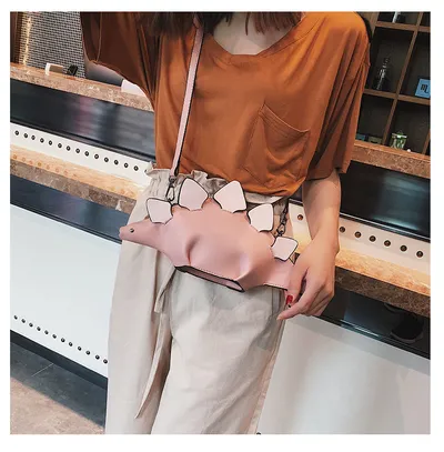 Female dinosaur shoulder bag