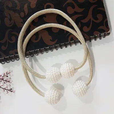 ستارة مغناطيسية تربط خرز اللؤلؤ