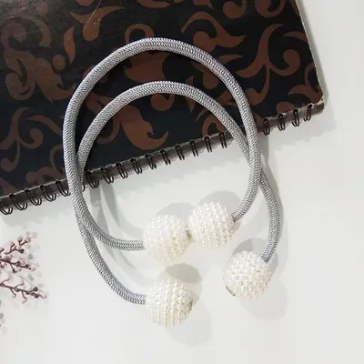 ستارة مغناطيسية تربط خرز اللؤلؤ