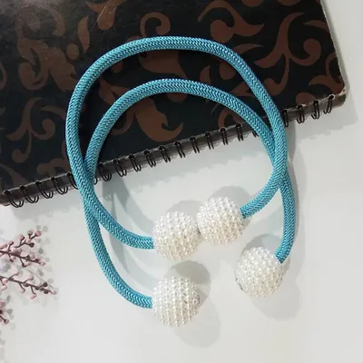 ستارة مغناطيسية تربط خرز اللؤلؤ