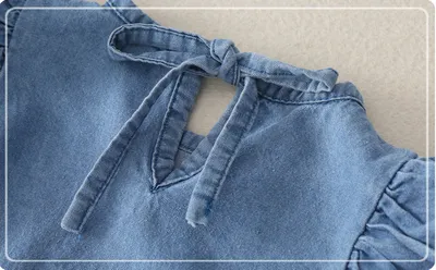 Girl baby jeans wear a triangular climbing suit