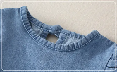 Girl baby jeans wear a triangular climbing suit