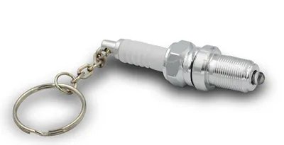LED light spark plug keychain