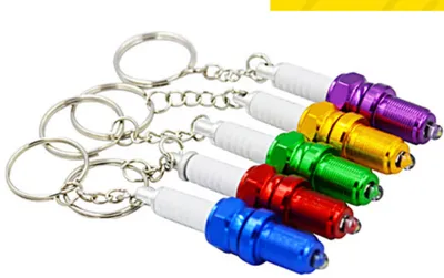 LED light spark plug keychain