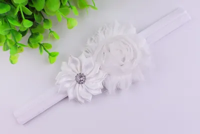 طوق رأس مزين بالزهور للأطفال