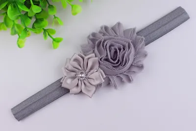 طوق رأس مزين بالزهور للأطفال