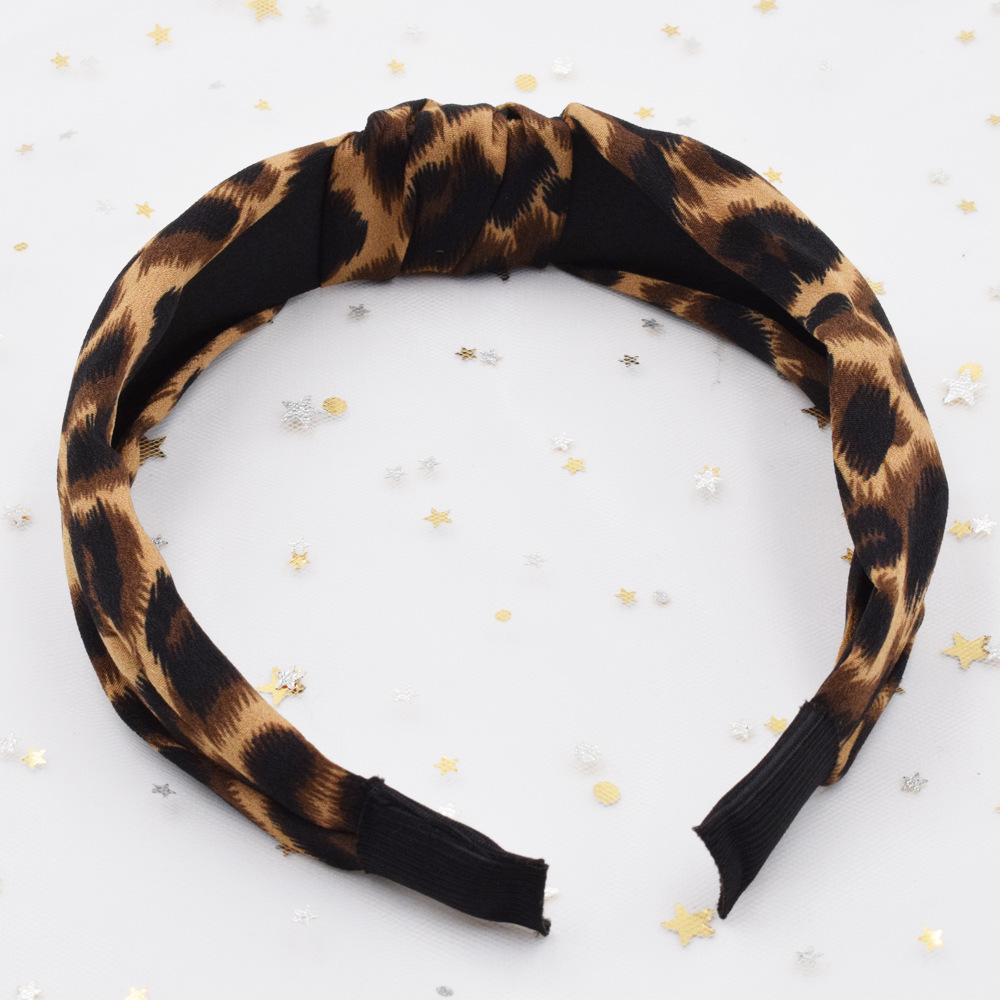 Cross knotted hair band