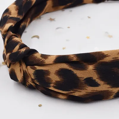 Cross knotted hair band