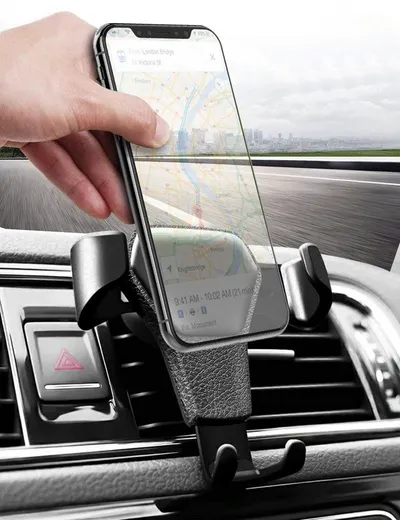 Leather grain gravity mobile phone car holder