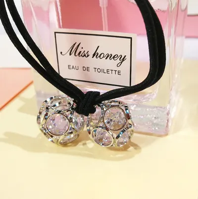 Korean version of hair accessories headdress Dongdaemun new alloy zircon hair ring hollow head rope double ball rubber band hair rope mixed batch