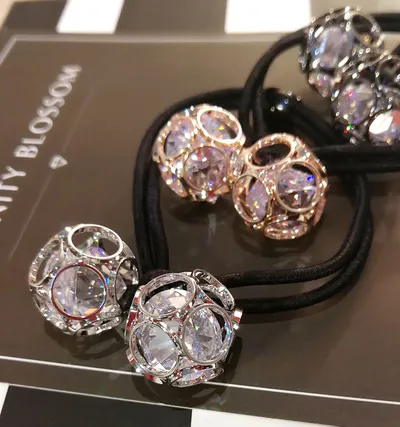 Korean version of hair accessories headdress Dongdaemun new alloy zircon hair ring hollow head rope double ball rubber band hair rope mixed batch