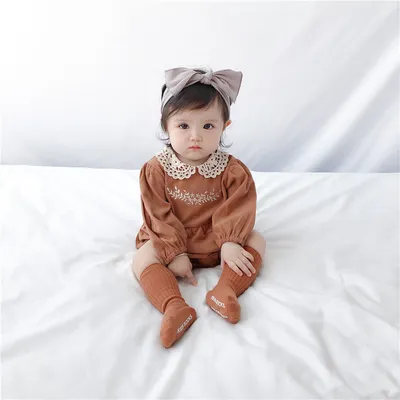 رومبر بأكمام طويلة بأكمام مربعة للأطفال