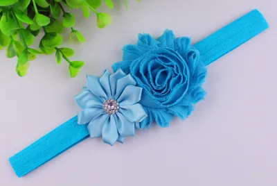 طوق رأس مزين بالزهور للأطفال