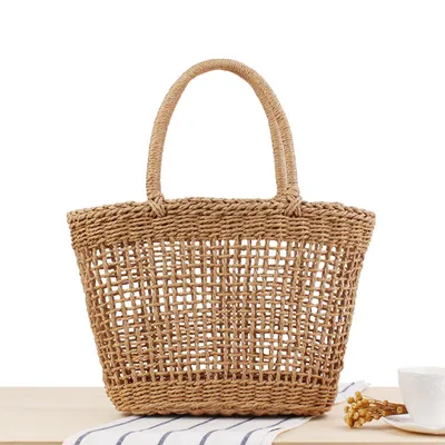 Hand-held New Hollow Woven Holiday Outing Straw Bag