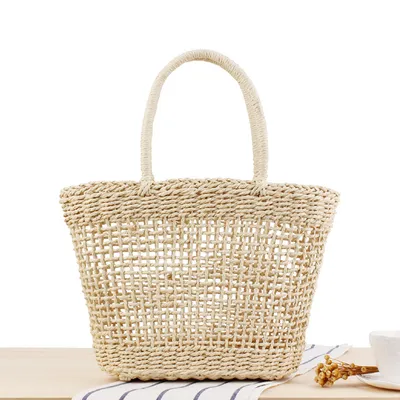 Hand-held New Hollow Woven Holiday Outing Straw Bag