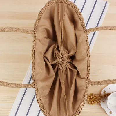 Hand-held New Hollow Woven Holiday Outing Straw Bag