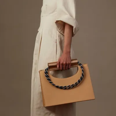 Metal bracelet shoulder bag