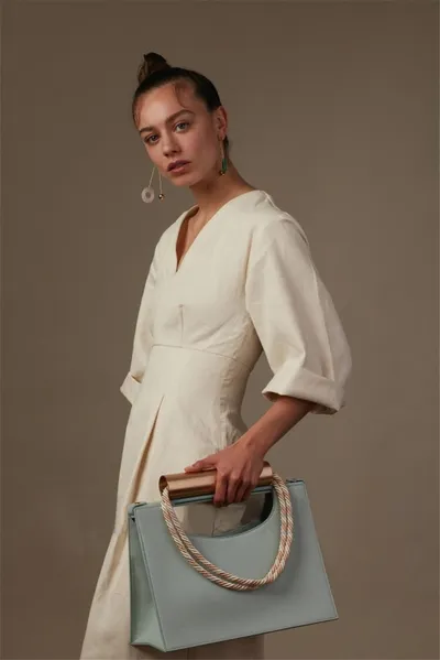 Metal bracelet shoulder bag