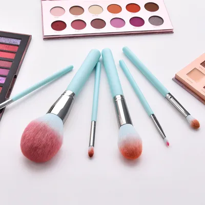 12 light blue makeup brushes