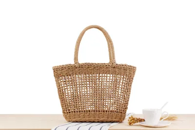 Hand-held New Hollow Woven Holiday Outing Straw Bag