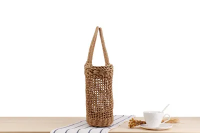 Hand-held New Hollow Woven Holiday Outing Straw Bag