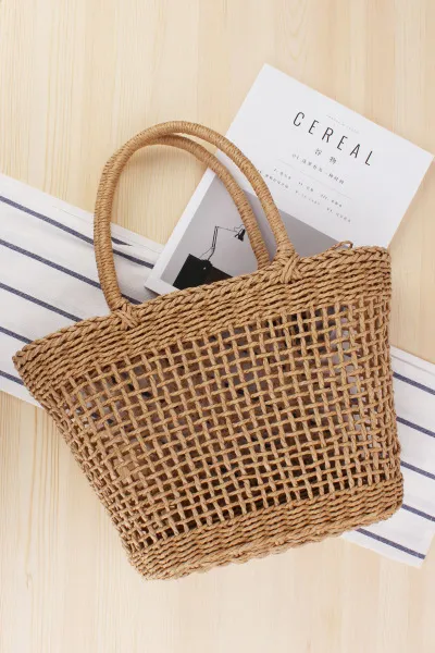 Hand-held New Hollow Woven Holiday Outing Straw Bag
