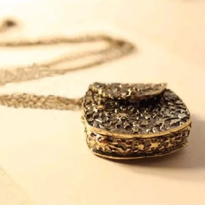 Exquisite Carved Metal Bags Shape Pendant Necklace