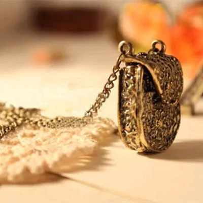Exquisite Carved Metal Bags Shape Pendant Necklace