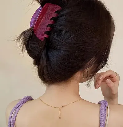 White Dragon Fruit Colored Hair Clip With A Spoon On The Back Of The Head