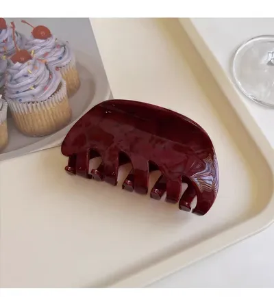 White Dragon Fruit Colored Hair Clip With A Spoon On The Back Of The Head