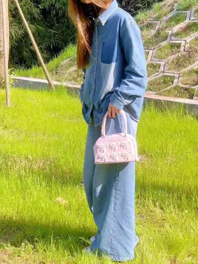 حقيبة يد نسائية أنيقة مزينة بفيونكة باليه
