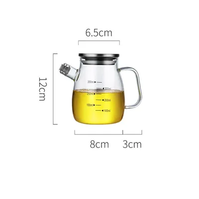 A glass oil can can be filled with oil cans