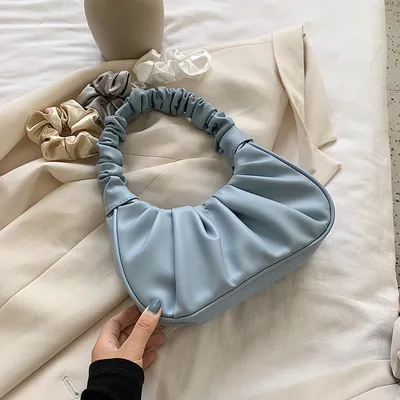 حقيبة كتف فرنسية أنيقة قابلة للطي بتصميم سحابي أحمر شبكي