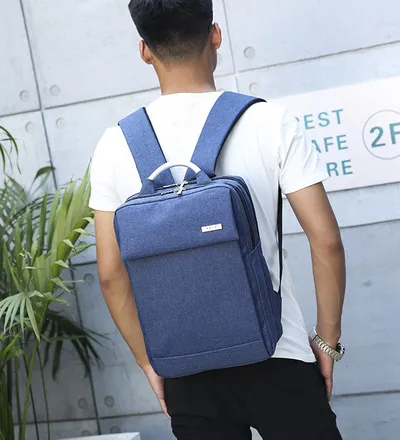 Manufacturers wholesale and customize new type of double shoulder bag multi function notebook PC package for men and women general business knapsack