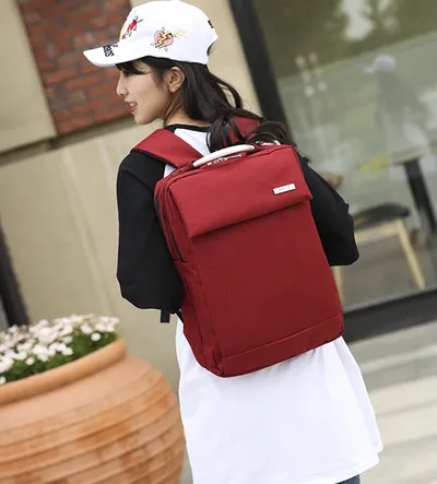 Manufacturers wholesale and customize new type of double shoulder bag multi function notebook PC package for men and women general business knapsack