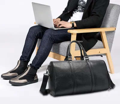 The first layer of leather leisure portable travel bag luggage bag with independent shoes single shoulder diagonal package