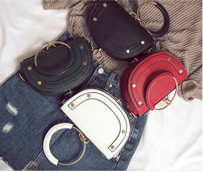 2007 New Ring Handbag Fashion 100 Rivet Saddle Bag Tang Yan Same Shoulder Skew Bag Tide