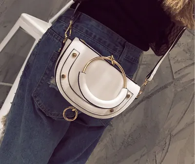 2007 New Ring Handbag Fashion 100 Rivet Saddle Bag Tang Yan Same Shoulder Skew Bag Tide