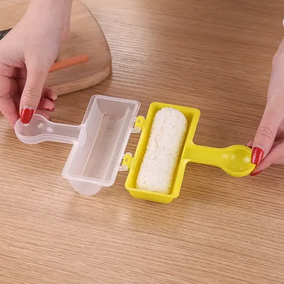 Hand-held rice ball sushi maker