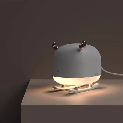 جهاز ترطيب وعلاج عطري صغير ومحمول يعمل بمنفذ USB بتصميم غزال وزلاجة