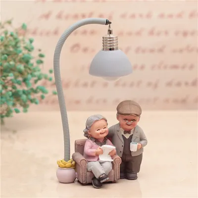 Grandma decorates the cake with a small night light