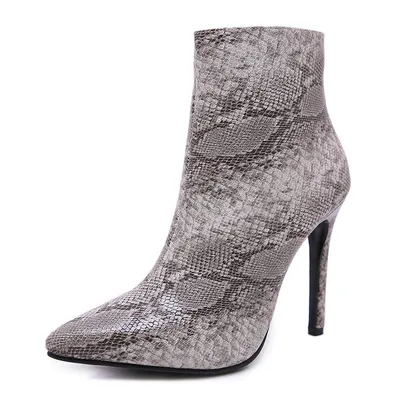 Side zip snakeskin heeled boots