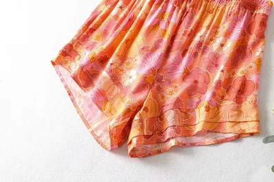 Ruffled Knotted Sling Top