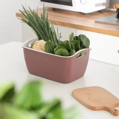 A basket for washing vegetables and fruit