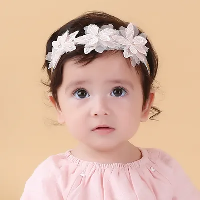 ربطة شعر على شكل زهرة صغيرة