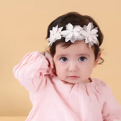 ربطة شعر على شكل زهرة صغيرة