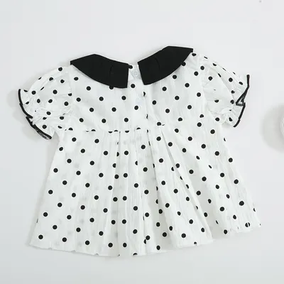 Two-piece baby girl blouse and pants