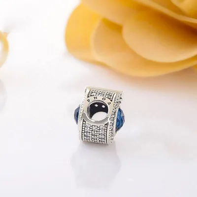 Brilliant pavé beads sparkling blue crown letter O charm
